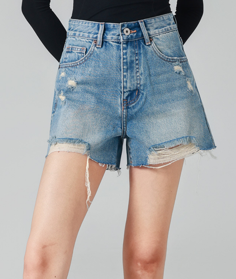 high-waisted denim shorts with frayed distressed edges