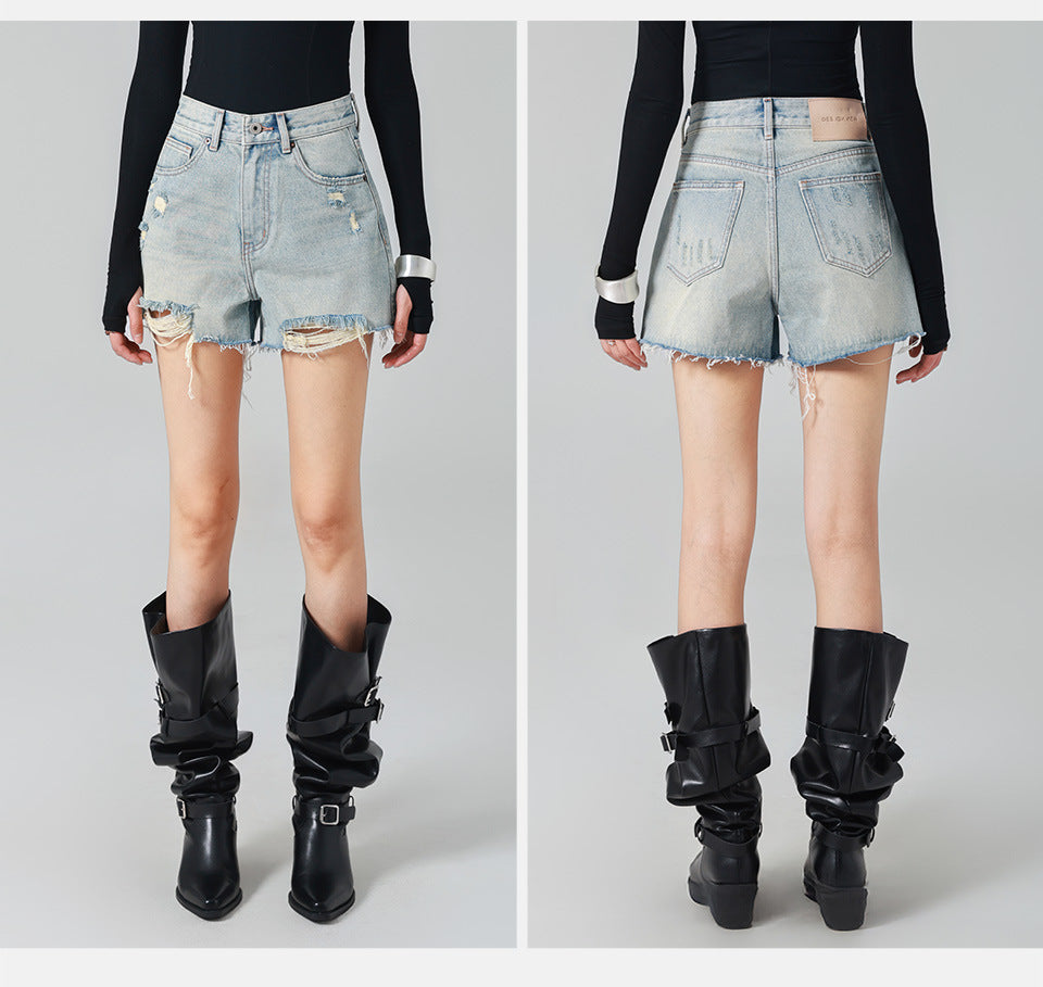 high-waisted denim shorts with frayed distressed edges